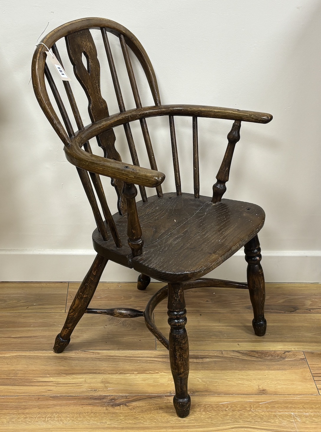 A 19th century ash and elm child's Windsor elbow chair, width 46cm, depth 32cm, height 76cm